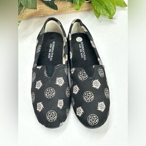 Black Slip-On Shoes with Supernatural Print